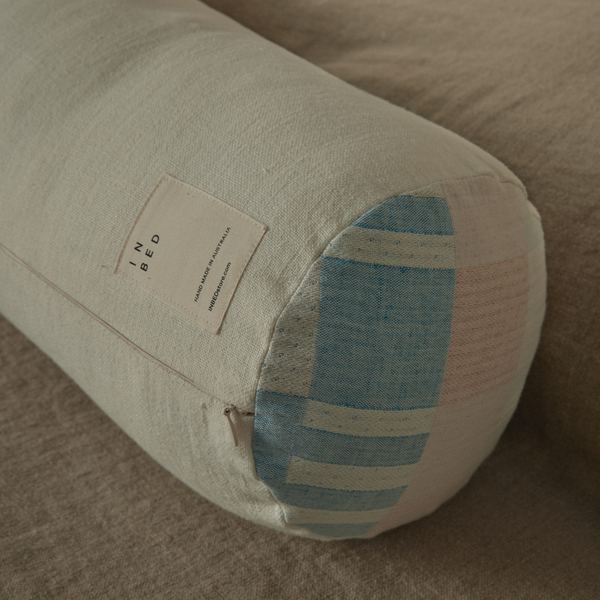 Atelier Bolster Cushion in White & Bauhaus